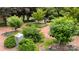 Tranquil community park with landscaped greenery, benches, and a memorial statue for reflection at 1011 Westbrook Dr # A, Charlotte, NC 28202