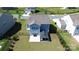 Aerial view of home with fenced yard and covered patio at 1019 Beacon Ave, Monroe, NC 28110