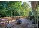 A spacious deck with outdoor seating and string lights, perfect for entertaining at 10925 Lassen Ct, Charlotte, NC 28214