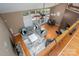 Spacious living room with hardwood floors, large windows, and comfortable seating arrangement at 10925 Lassen Ct, Charlotte, NC 28214