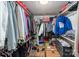 Spacious walk-in closet with organized shelves and racks for ample storage and organization at 10925 Lassen Ct, Charlotte, NC 28214