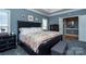 A primary bedroom offers ample space, lots of natural light, and high ceilings at 126 Doyle Farm Ln, Mooresville, NC 28115