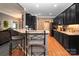 A kitchen boasts granite countertops, stainless appliances, and hardwood floors at 126 Doyle Farm Ln, Mooresville, NC 28115