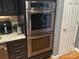 A modern kitchen boasts stainless steel double ovens at 126 Doyle Farm Ln, Mooresville, NC 28115