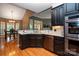 A modern kitchen has stainless steel appliances and beautiful granite countertops at 126 Doyle Farm Ln, Mooresville, NC 28115