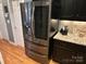 A modern kitchen features a large, stainless steel LG refrigerator at 126 Doyle Farm Ln, Mooresville, NC 28115