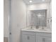 Bathroom featuring a double sink vanity and a large mirror at 128 Cherry Birch St, Mooresville, NC 28117