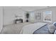 Bright main bedroom with neutral walls, carpet, and multiple windows at 128 Cherry Birch St, Mooresville, NC 28117