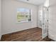 An airy, versatile room featuring wood-look flooring and a window at 128 Cherry Birch St, Mooresville, NC 28117