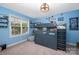 Blue bedroom with loft bed, themed decor, and natural light from the window at 1308 Stonewyck Dr, Salisbury, NC 28146