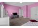 Bright bedroom featuring a spacious layout, carpet flooring, and closet for ample storage at 146 Kerri Dawn Ln, Locust, NC 28097