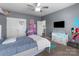 Cozy bedroom with stylish decor, includes a ceiling fan and closet for storage at 146 Kerri Dawn Ln, Locust, NC 28097