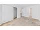 Bedroom featuring neutral carpet and an attached closet at 1604 Sharon W Rd, Charlotte, NC 28210