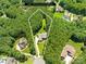 Aerial view showcases the home's lot lines, surrounding lush trees, and prime location at 168 Blue Ridge Trl, Mooresville, NC 28117