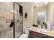 Bathroom featuring a granite vanity, a glass enclosed shower, and neutral color palette at 168 Blue Ridge Trl, Mooresville, NC 28117