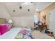 This bedroom offers a dedicated desk area and a bright window at 168 Blue Ridge Trl, Mooresville, NC 28117
