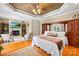 This spacious bedroom features hardwood floors, a fireplace, and built-in storage at 168 Blue Ridge Trl, Mooresville, NC 28117