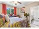 Comfortable bedroom with large windows offering ample natural light, a ceiling fan, and calming paint at 168 Blue Ridge Trl, Mooresville, NC 28117