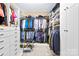 This closet is well organized with hanging storage, shelving, and drawer units at 168 Blue Ridge Trl, Mooresville, NC 28117