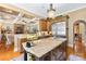 Kitchen with a large island, granite countertops, and stainless steel appliances at 168 Blue Ridge Trl, Mooresville, NC 28117