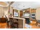 Open concept kitchen with custom cabinets, granite countertops and an island at 168 Blue Ridge Trl, Mooresville, NC 28117