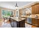 Open kitchen with a view of the dining area and backyard at 168 Blue Ridge Trl, Mooresville, NC 28117