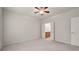 A light, airy bedroom features carpeting, ceiling fan, and views to the bathroom at 17513 Hawks View Dr, Fort Mill, SC 29707