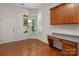 Bright dining area with hardwood floors, and a bank of windows bringing in natural light at 17513 Hawks View Dr, Fort Mill, SC 29707