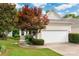 Charming home with a two-car garage, beautiful landscaping, and a well-manicured lawn at 17513 Hawks View Dr, Fort Mill, SC 29707