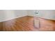 Sunlit bedroom features gleaming hardwood floors and a window offering natural light at 2020 Dawnshire Dr, Gastonia, NC 28054