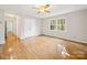 Bedroom featuring hardwood floors, closet, and a window with outside view at 2020 Dawnshire Dr, Gastonia, NC 28054