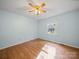 Bright bedroom with hardwood floors and a single window at 2020 Dawnshire Dr, Gastonia, NC 28054
