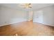 Large bedroom features hardwood floors, ceiling fan, and double door closet at 2020 Dawnshire Dr, Gastonia, NC 28054