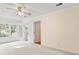 Bedroom with carpet, ceiling fan, windows and doors to closet and bathroom at 2020 Dawnshire Dr, Gastonia, NC 28054