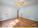 Bright bedroom with hardwood floors and closet at 2020 Dawnshire Dr, Gastonia, NC 28054