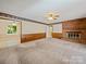 Cozy living room with a brick fireplace and neutral carpet at 2020 Dawnshire Dr, Gastonia, NC 28054