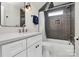 Bathroom featuring modern vanity, subway tile, and bright lighting at 2333 Greenland Ave, Charlotte, NC 28208