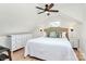 Bright bedroom features neutral walls, ceiling fan, and white dresser and side tables at 2333 Greenland Ave, Charlotte, NC 28208