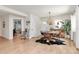 Dining room with hardwood floors, natural light, and view to the living room at 2333 Greenland Ave, Charlotte, NC 28208