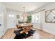 Dining room with hardwood floors, natural light, and modern furnishings at 2333 Greenland Ave, Charlotte, NC 28208