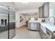 Well-lit kitchen featuring stainless steel appliances and white subway tile backsplash at 2333 Greenland Ave, Charlotte, NC 28208