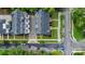 Aerial view of modern townhomes with rooftop patios, landscaped yards, and street parking in a desirable urban neighborhood at 2969 Simpson Dr, Charlotte, NC 28205