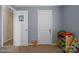 Cozy bedroom featuring light blue walls and convenient storage shelves for toys and books at 308 Laurel Ridge Dr, Lincolnton, NC 28092