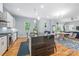 Bright kitchen with island, stainless appliances, and adjoining dining area, great for entertaining at 327 S Turner Ave, Charlotte, NC 28208