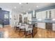 Stylish kitchen with island, wine fridge, and stainless steel appliances, perfect for culinary enthusiasts at 327 S Turner Ave, Charlotte, NC 28208