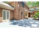 Charming backyard featuring a brick house, a back deck, and a well-maintained yard at 3730 Monique Ln, Charlotte, NC 28210
