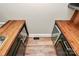 Elegant bar area featuring dual beverage coolers and wooden countertops, creating a refined space at 3730 Monique Ln, Charlotte, NC 28210