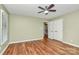 Bedroom showcasing hardwood floors, natural light, and closet access at 3730 Monique Ln, Charlotte, NC 28210