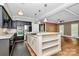 Modern kitchen with granite countertops, stainless steel appliances, and open layout to living space at 3730 Monique Ln, Charlotte, NC 28210