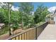 Deck overlooking backyard waterfront with wooded area and boat dock at 416 Plantation Way # 3, Mount Gilead, NC 27306